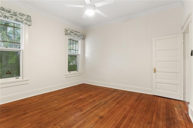 unfurnished room featuring ceiling fan, wood-type flooring, and ornamental molding