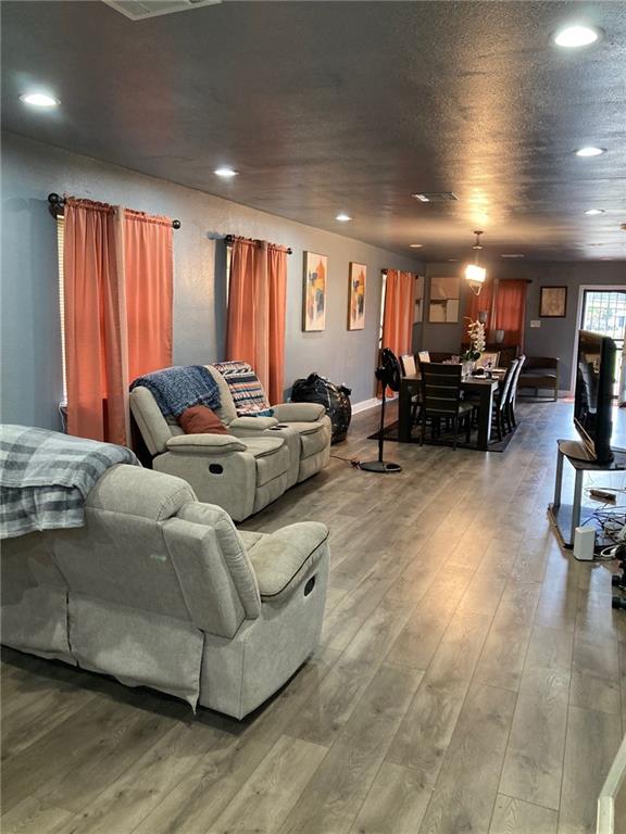 living room with hardwood / wood-style floors