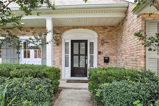 entrance to property with a porch