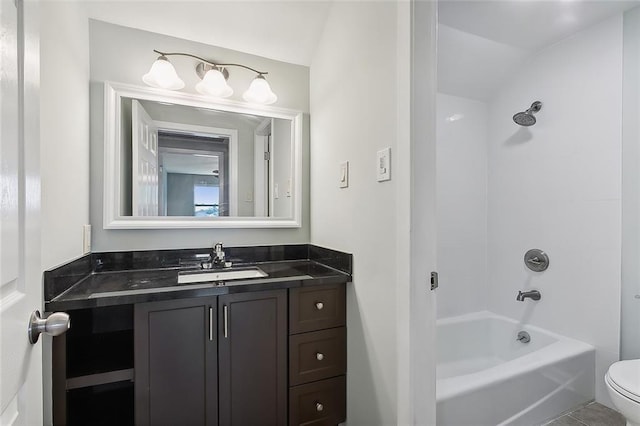 full bathroom with tile patterned flooring, shower / bathing tub combination, vanity, and toilet