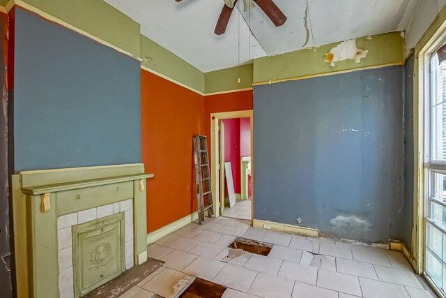 122729 Carondelet St, New Orleans, LA 70130 - tiled spare room featuring baseboards and a ceiling fan