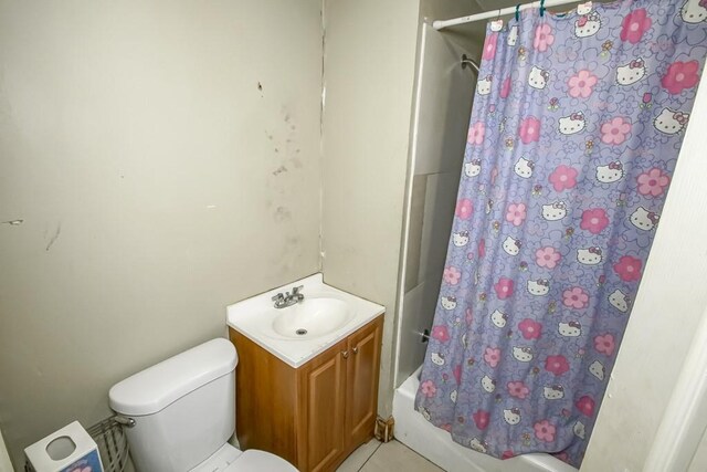 122729 Carondelet St, New Orleans, LA 70130 - bathroom featuring toilet, shower / tub combo with curtain, and vanity