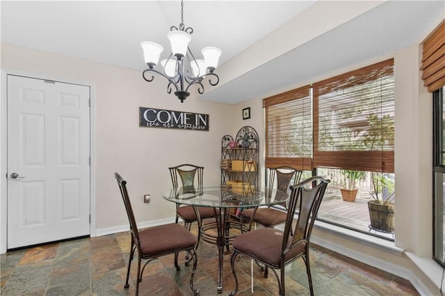 dining room featuring a chandelier