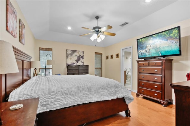 bedroom with light wood-type flooring and ceiling fan