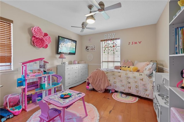 bedroom featuring ceiling fan and wood-type flooring