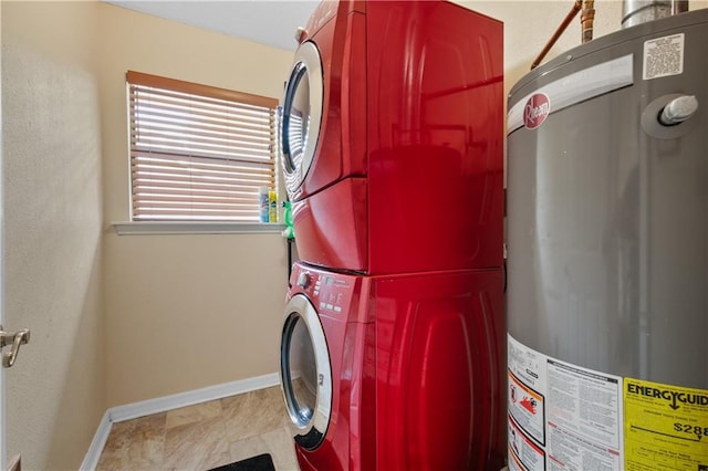 laundry room featuring gas water heater and stacked washer and clothes dryer