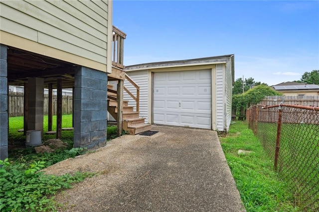 garage with a yard