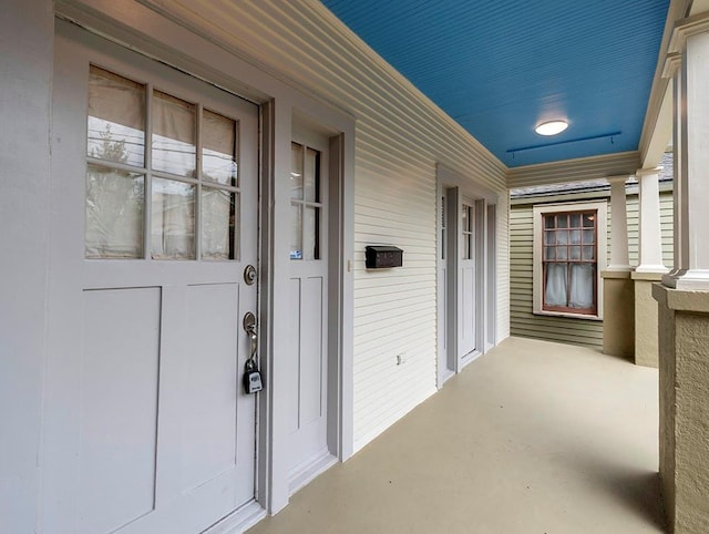 doorway to property featuring a porch