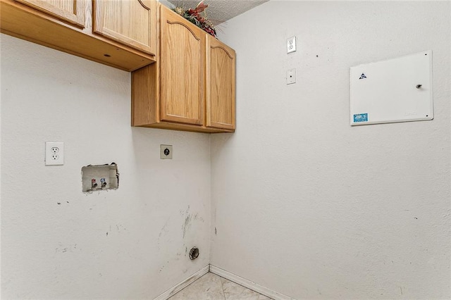 laundry room with washer hookup, hookup for an electric dryer, and cabinets