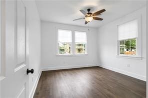 unfurnished room featuring dark hardwood / wood-style flooring and ceiling fan