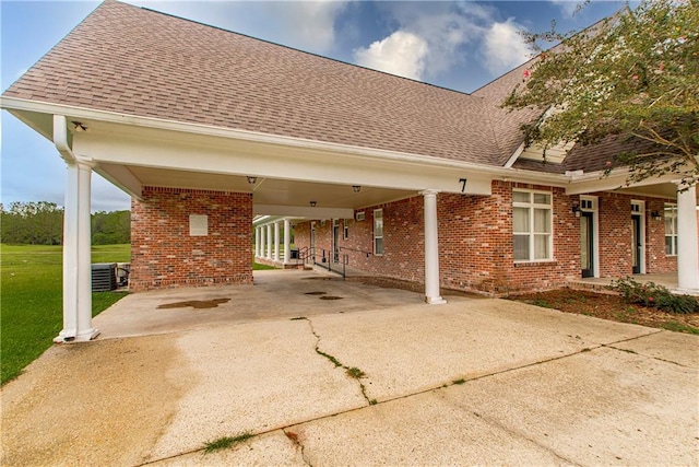 back of house featuring a yard and a patio area