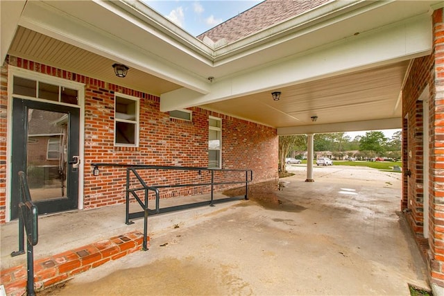 view of patio / terrace with a carport