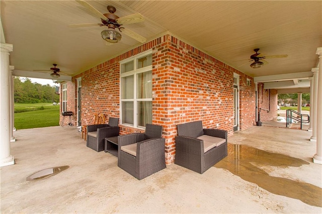 view of patio featuring ceiling fan and an outdoor living space