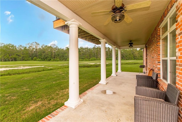 view of patio featuring ceiling fan and covered porch