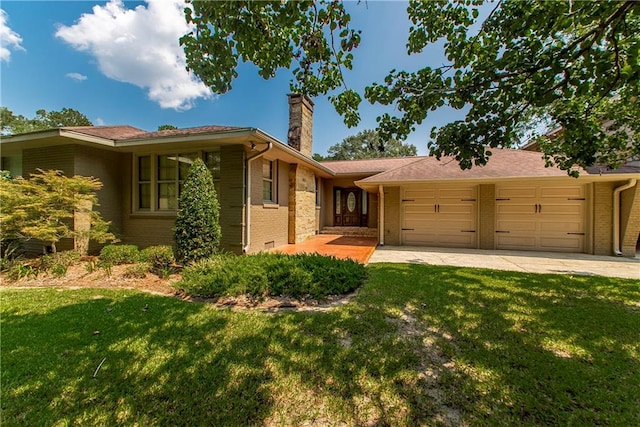 ranch-style home featuring a garage and a front lawn