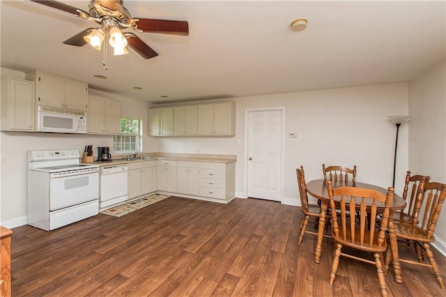 interior space featuring white cabinetry, ceiling fan, white appliances, and dark hardwood / wood-style flooring