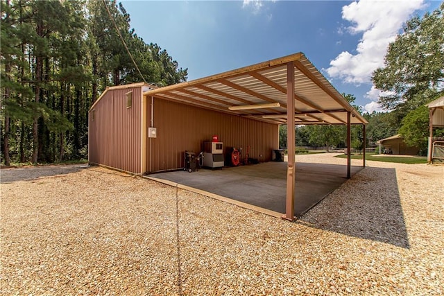 view of parking / parking lot featuring driveway