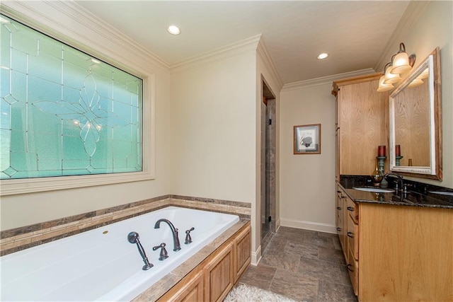 full bath with vanity, baseboards, ornamental molding, a shower stall, and a garden tub