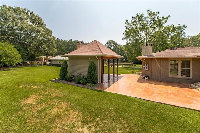 view of yard with a patio