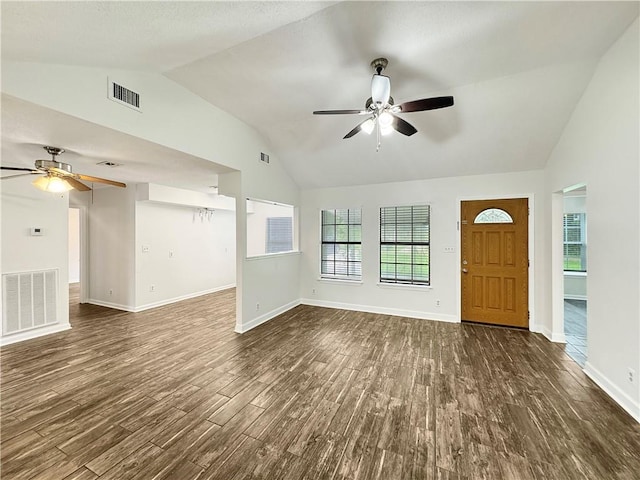 entrance foyer featuring dark wood-type flooring, ceiling fan, and lofted ceiling