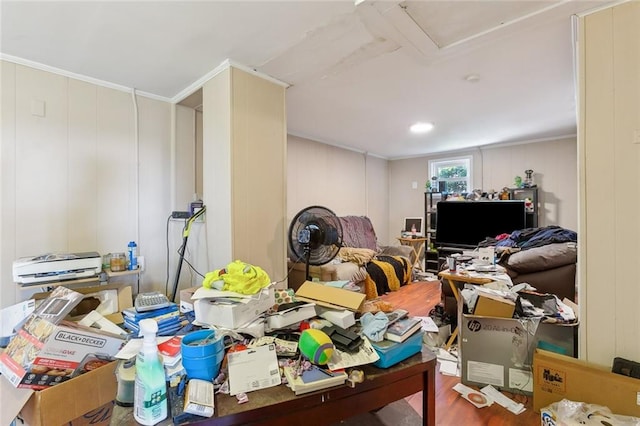 misc room with hardwood / wood-style flooring and ornamental molding