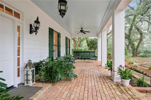 view of patio / terrace with a porch and ceiling fan