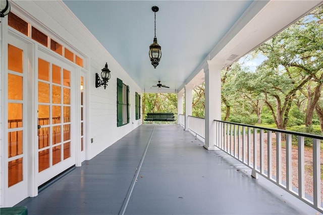 view of patio / terrace featuring ceiling fan and a porch