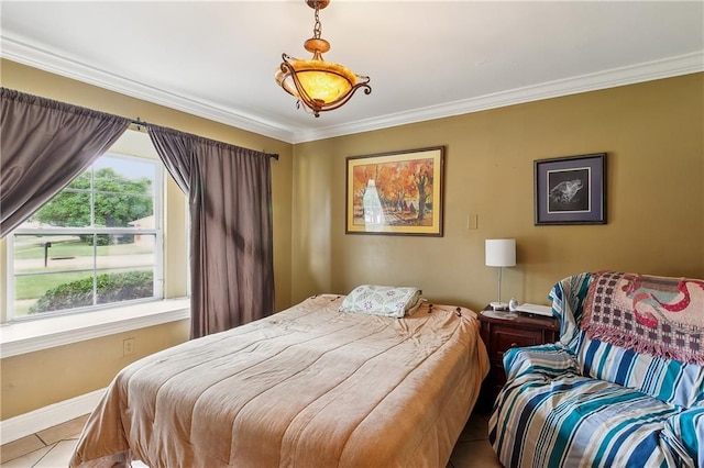 bedroom featuring ornamental molding and light tile patterned floors