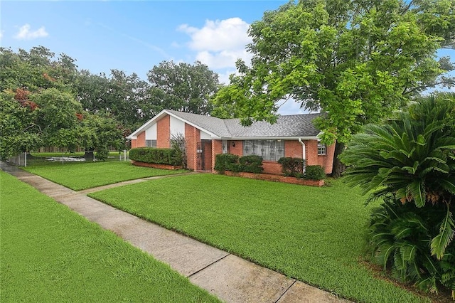 view of front facade with a front lawn