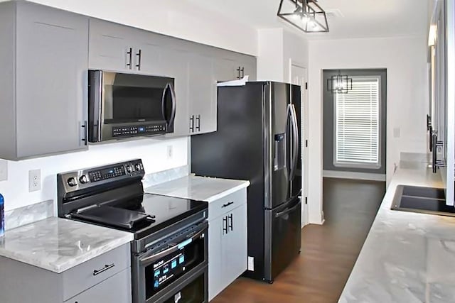 spare room with hardwood / wood-style floors and ceiling fan