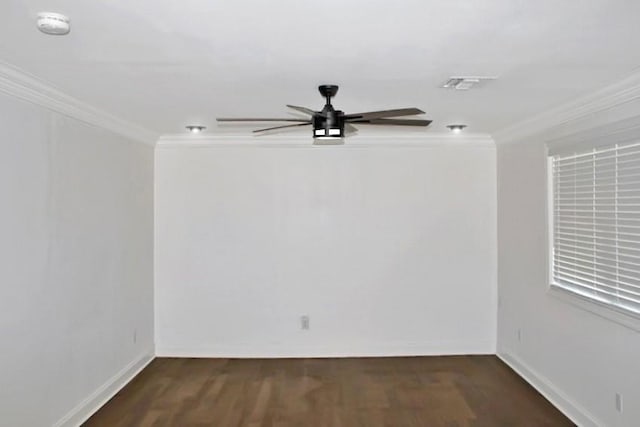 spare room with ornamental molding, dark hardwood / wood-style flooring, and ceiling fan