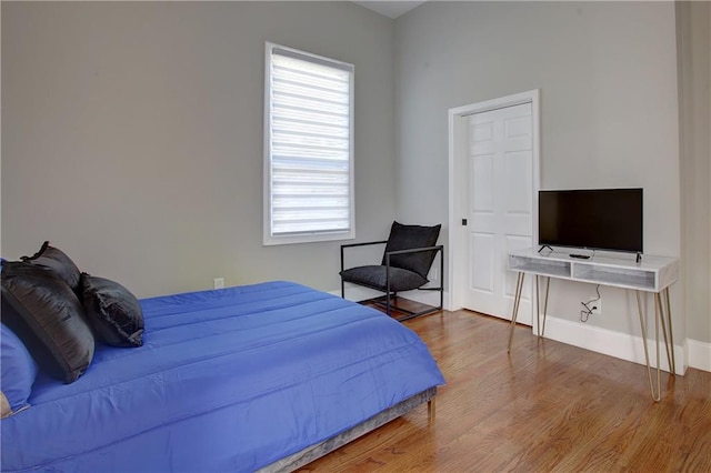 bedroom featuring hardwood / wood-style flooring