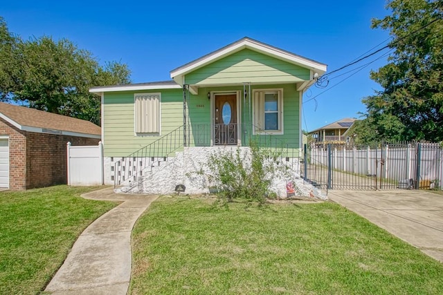 bungalow with a front lawn