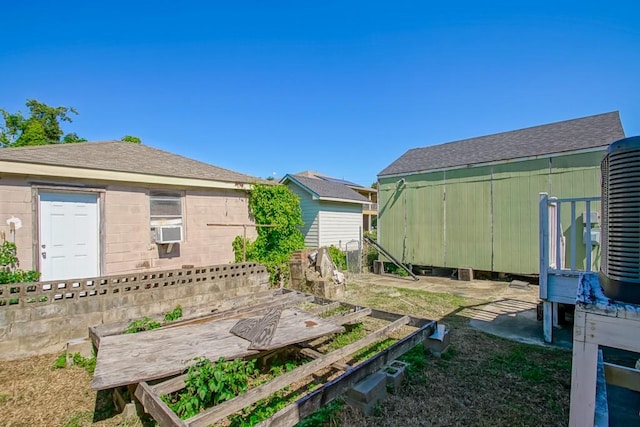 view of yard featuring cooling unit and a patio area