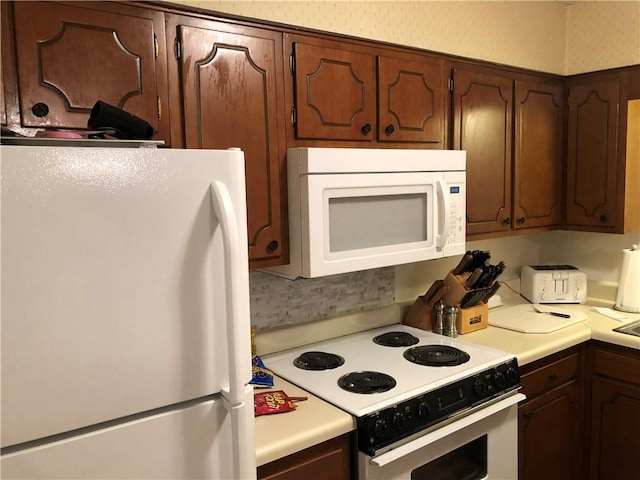 kitchen with white appliances