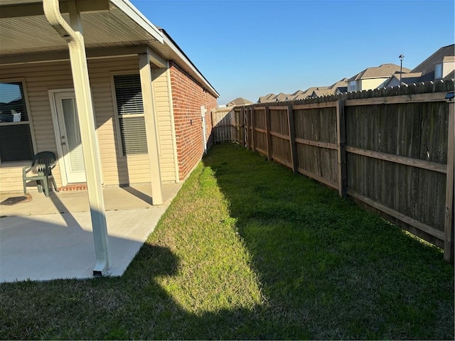 view of yard with a patio area