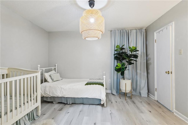 bedroom featuring light hardwood / wood-style floors