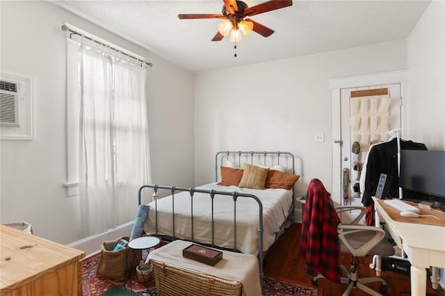 bedroom featuring ceiling fan and hardwood / wood-style flooring