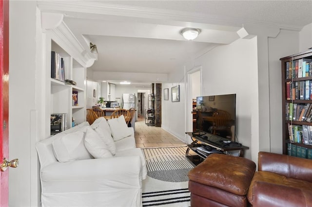 living room featuring built in shelves