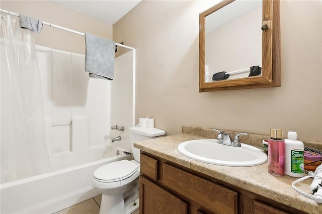 full bathroom with tile patterned floors, shower / bath combo, toilet, and vanity