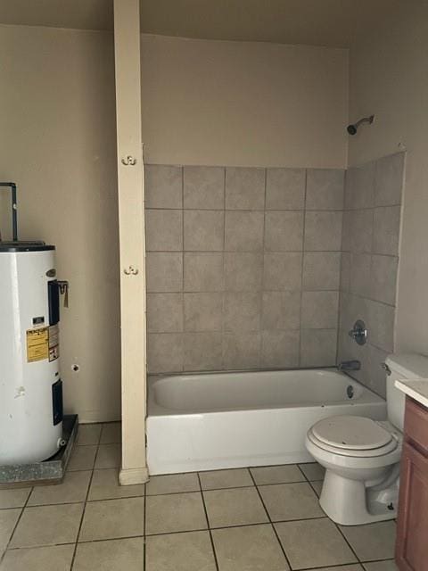 full bathroom with tile patterned floors, vanity, electric water heater, and tiled shower / bath combo