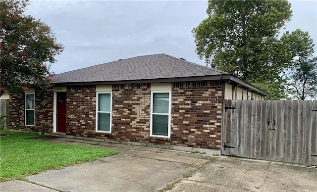 exterior space with a front lawn