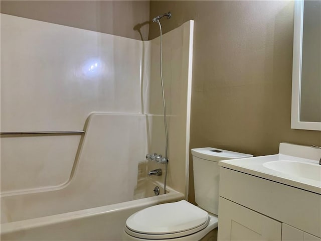 full bathroom featuring vanity, toilet, and bathing tub / shower combination