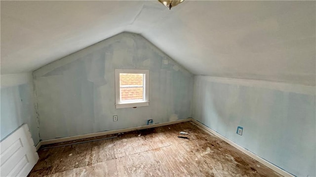 bonus room featuring vaulted ceiling