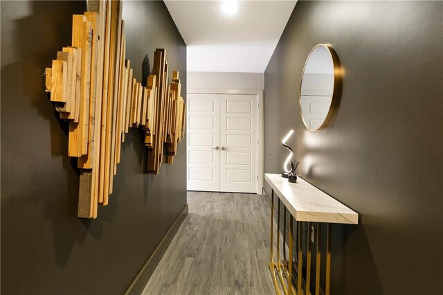 hallway featuring dark hardwood / wood-style flooring