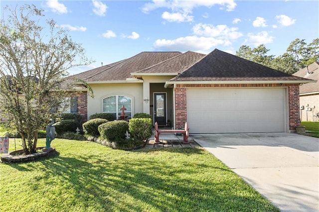 ranch-style home featuring a front yard and a garage