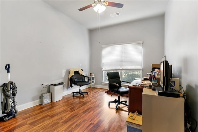 office space with wood-type flooring and ceiling fan