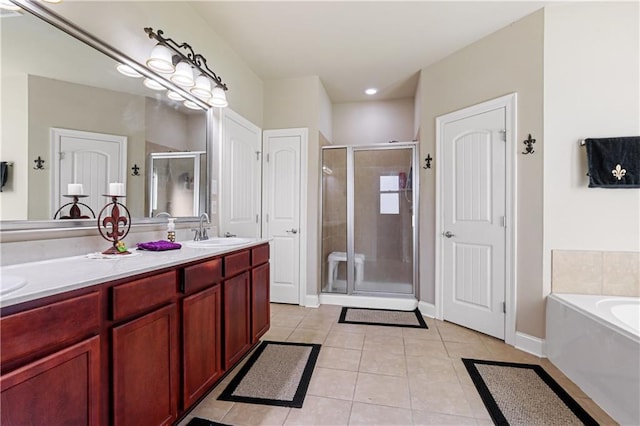 bathroom with vanity, separate shower and tub, and tile patterned floors