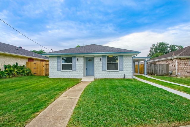 view of front of home with a front yard