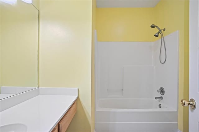 bathroom featuring vanity and shower / tub combination